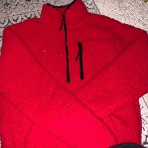 red fluffy half zip womans